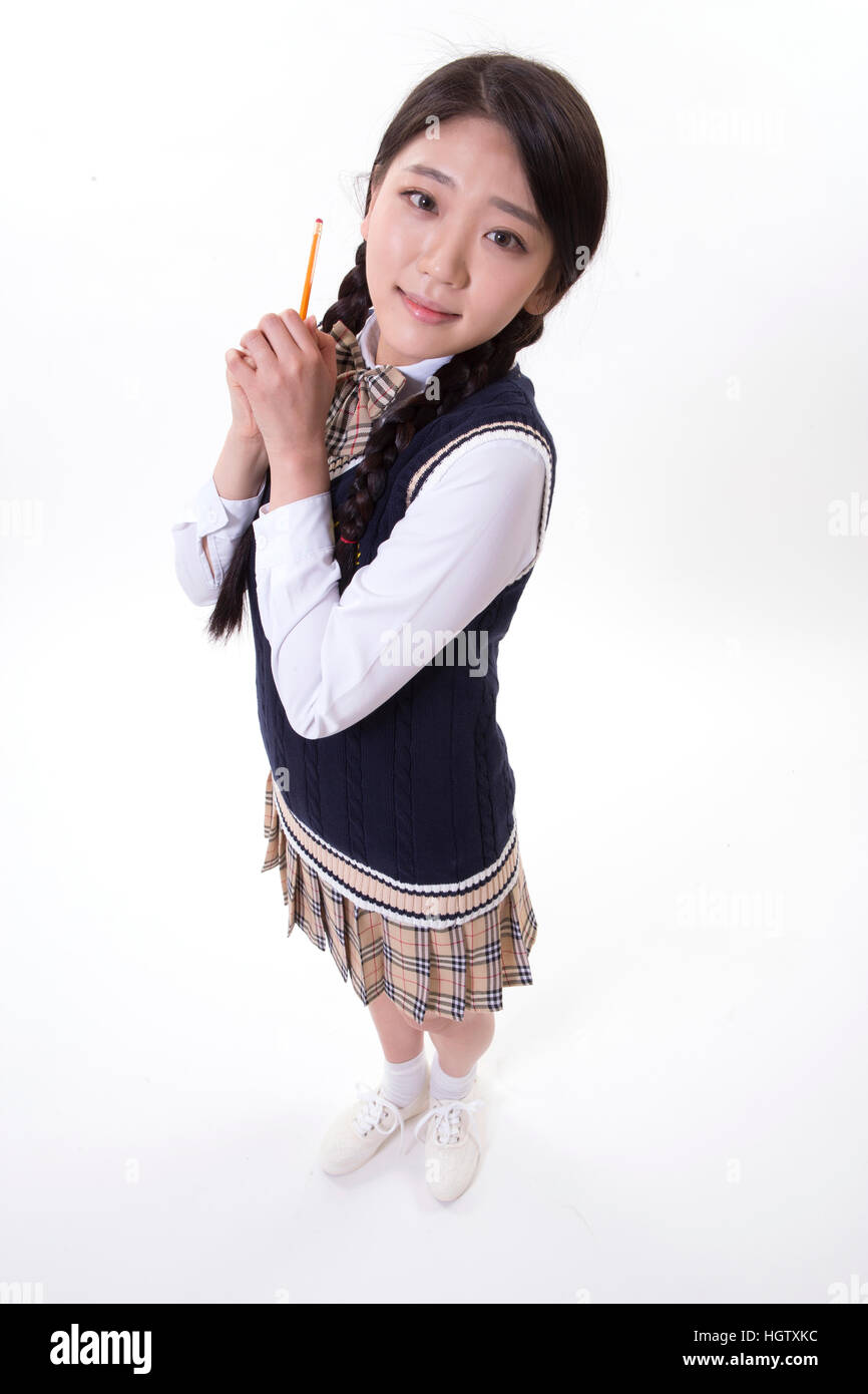 Smiling high school girl pencil hi-res stock photography and images - Alamy
