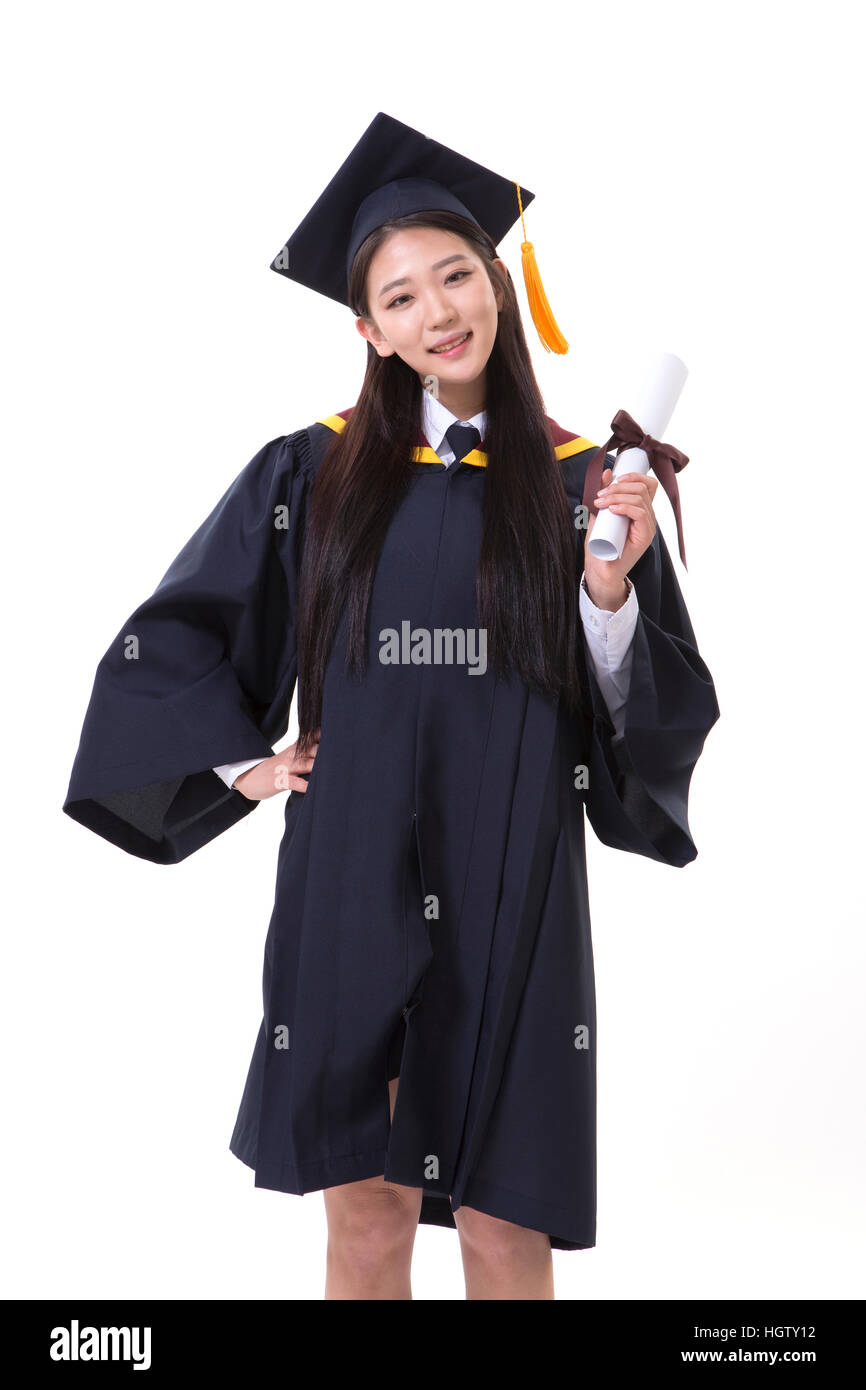 Smiling female graduate posing Stock Photo - Alamy