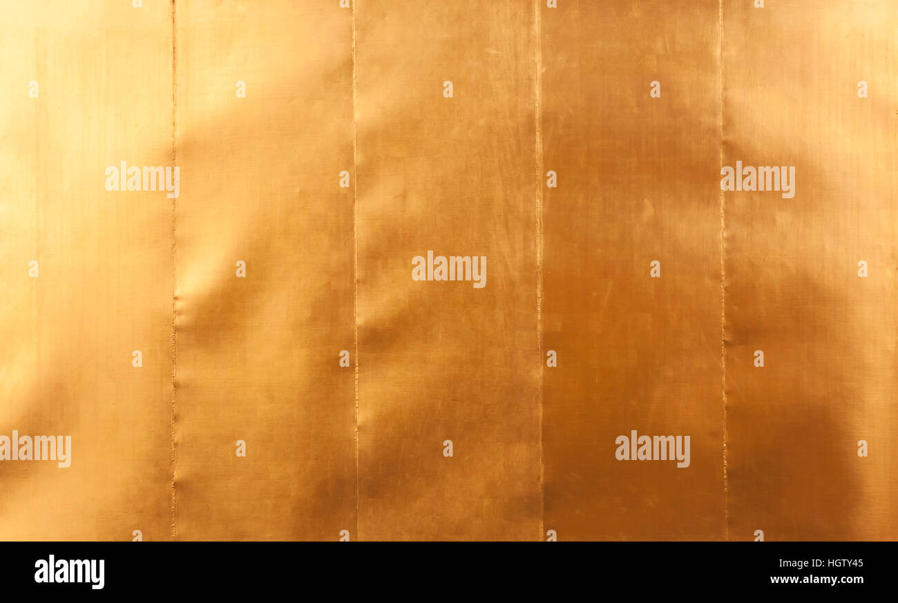 Sheet metal gold solid black background industry Stock Photo Alamy