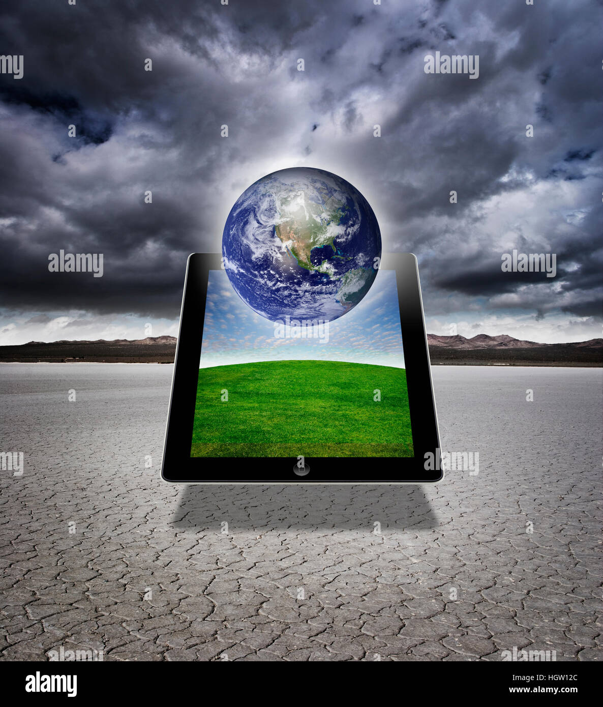 Digital Composite Of A Digital Tablet With The Earth Stock Photo