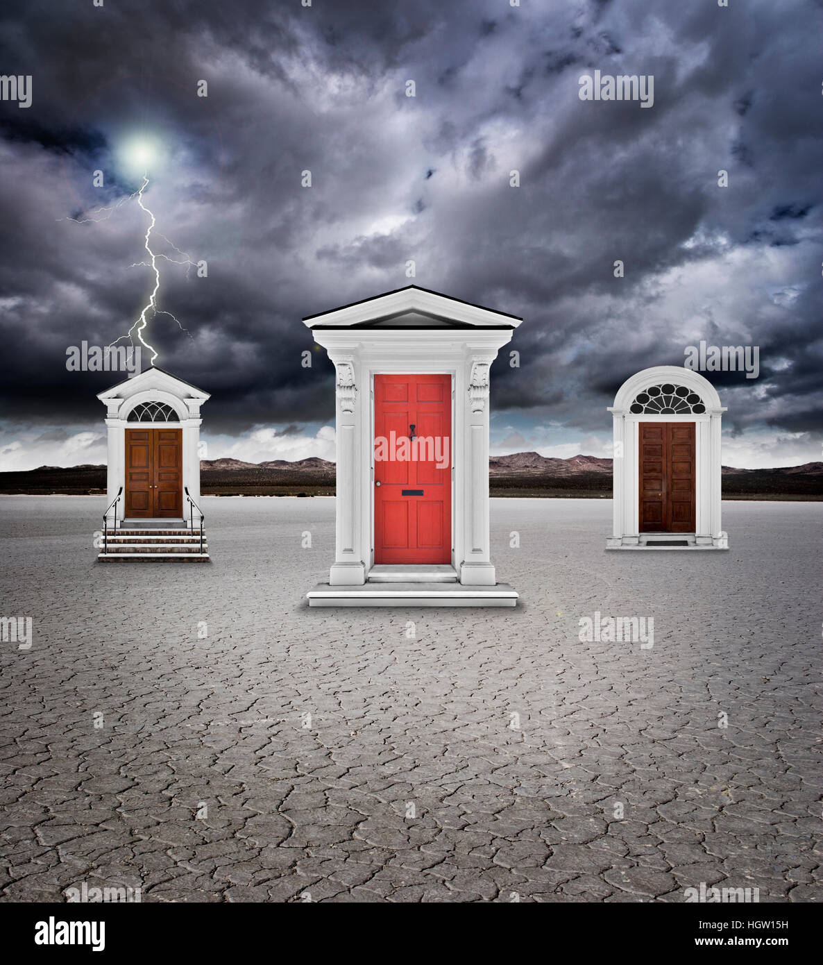Three Doors In A Dry Lake Bed With Lightning In Sky Stock Photo