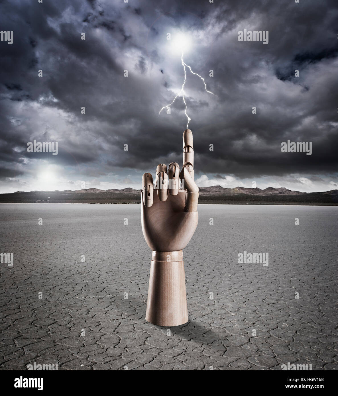 Manikin Hand Pointing With Lightning Stock Photo