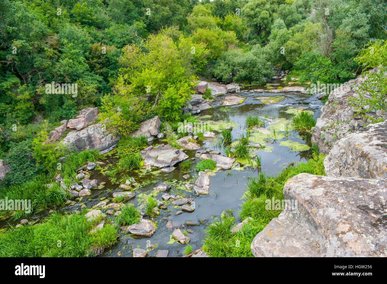 The view on the river rocks from the top of the canyon. Stock Photo