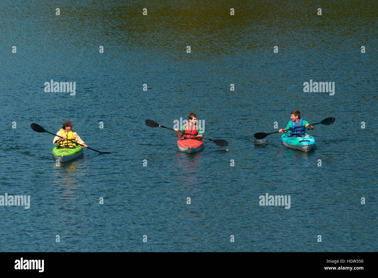 A group of kayakers paddle on the Waterbury Reservoir in Waterbury