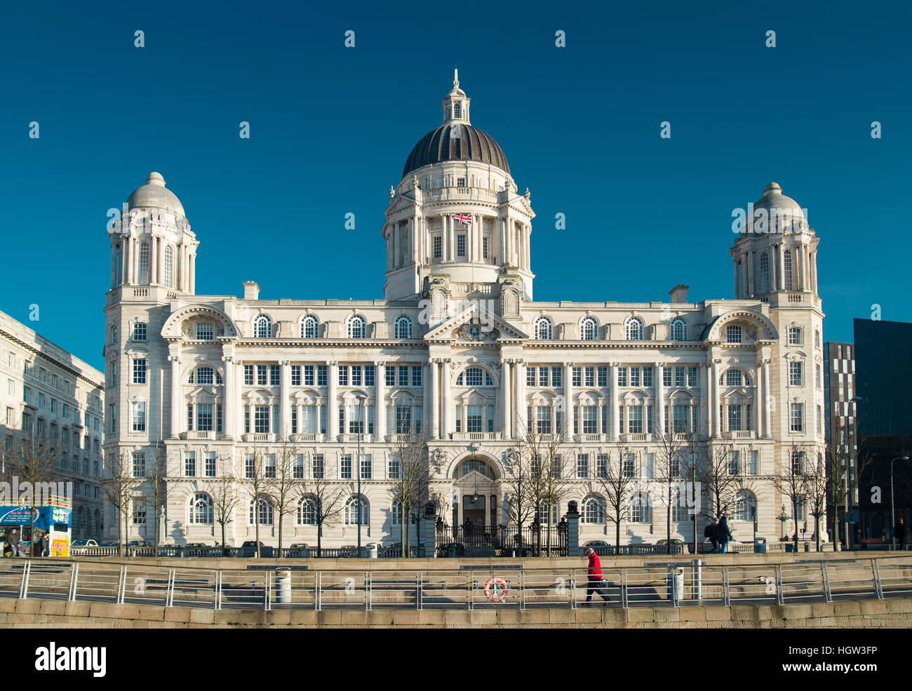 Port of Liverpool building, Liverpool waterfront on clear sunny day with blue sky. Stock Photo