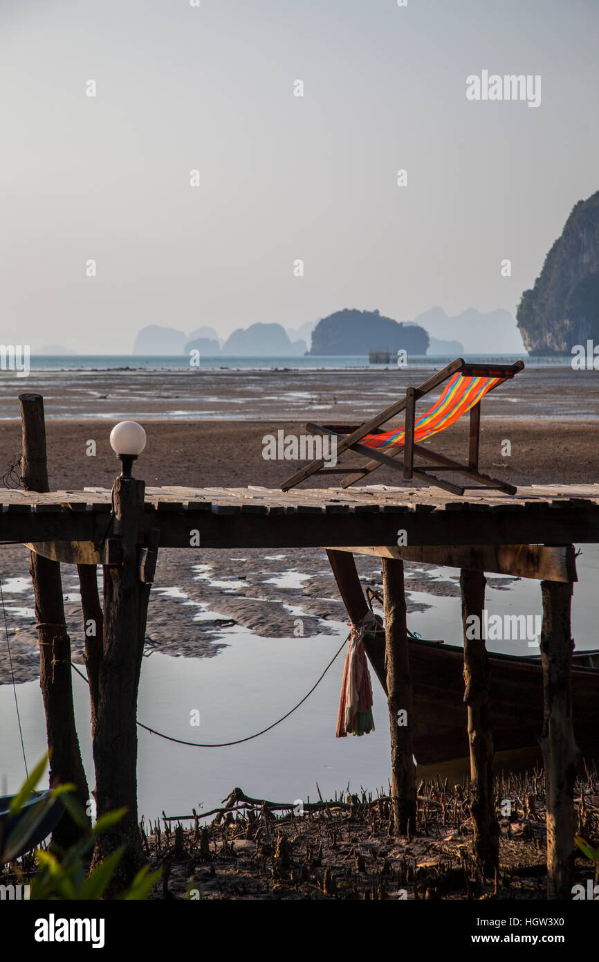 Chairs on deck, Mangrove beach next to Bananas Bungalows Krabi