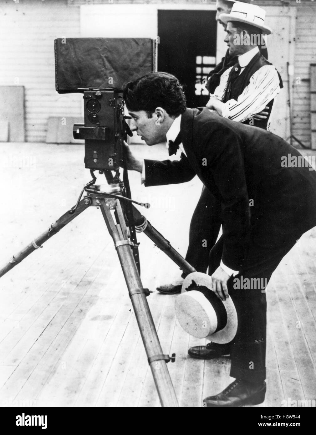 CHARLIE CHAPLIN (1889-1977) English comic actor  about 1918 with at right film director D.W.Griffith Stock Photo