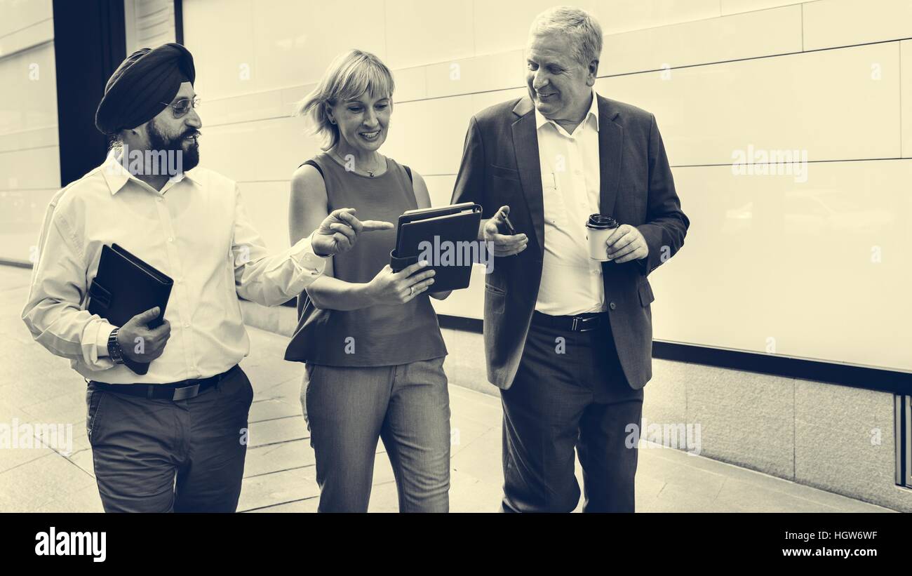 Business People Walking Together Concept Stock Photo - Alamy