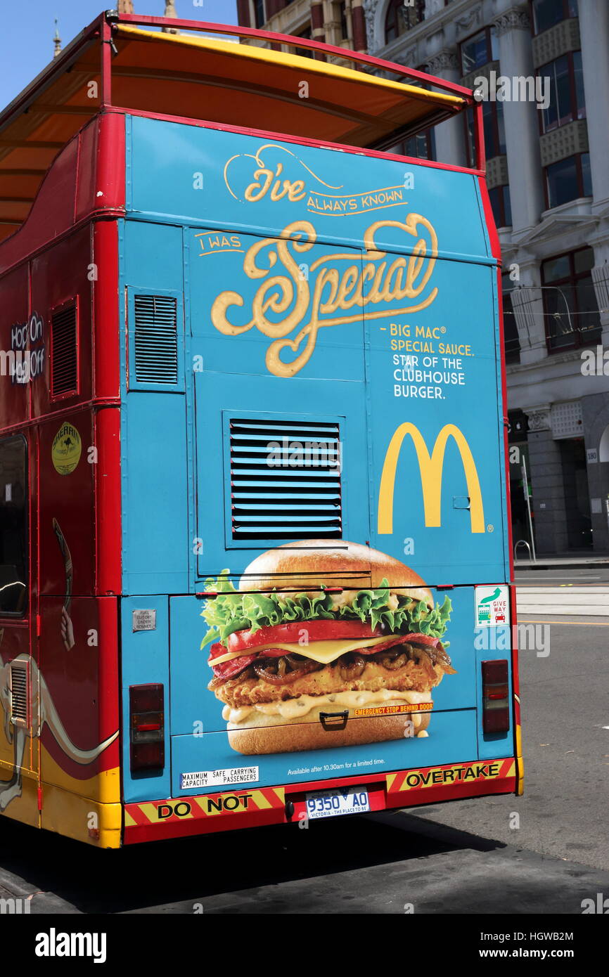 Australian McDonald's advertising at the back of Melbourne Sightseeing Bus parked near Federation square Melbourne  Australia Stock Photo