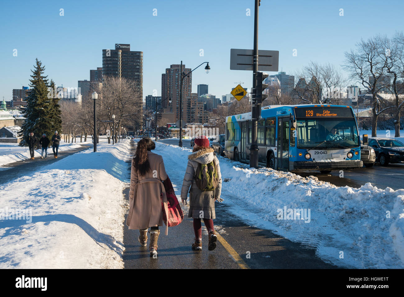 Two girls walking in park hi-res stock photography and images - Alamy