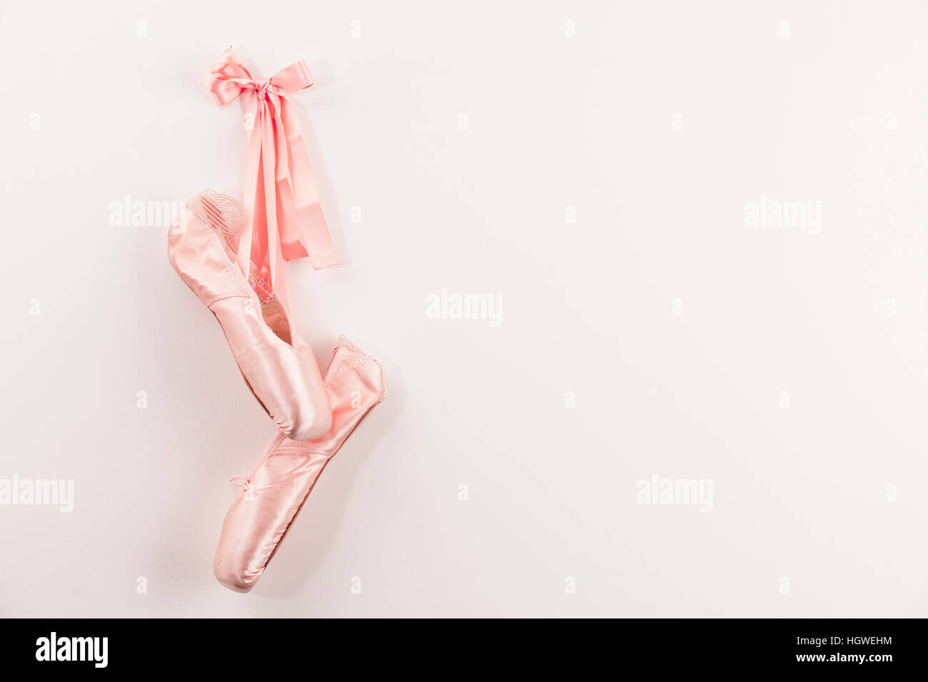 Pink Ballet shoes on white background. Stock Photo