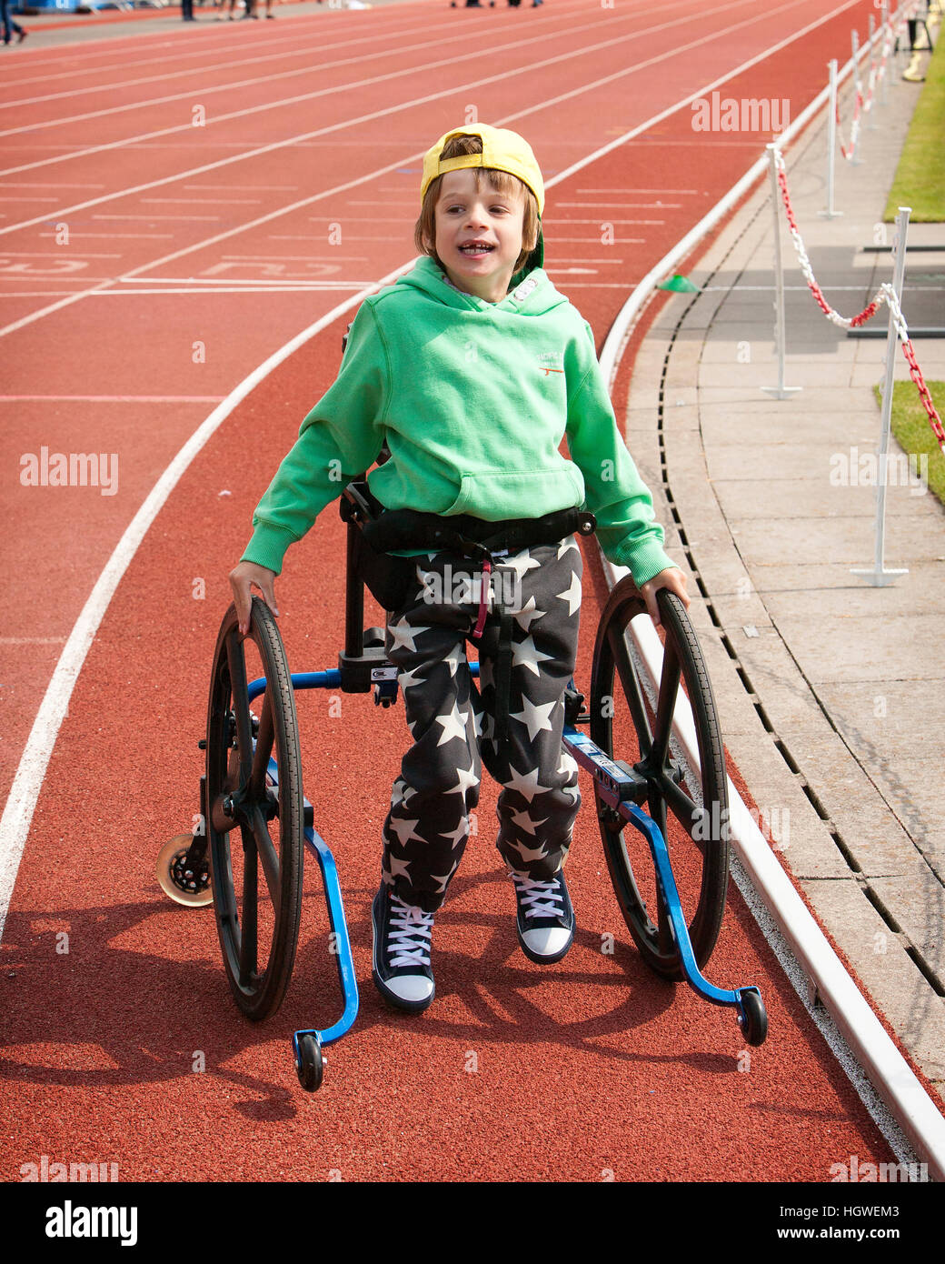 Young boy with Cerebral Palsy in walking frame on sports day Stock Photo