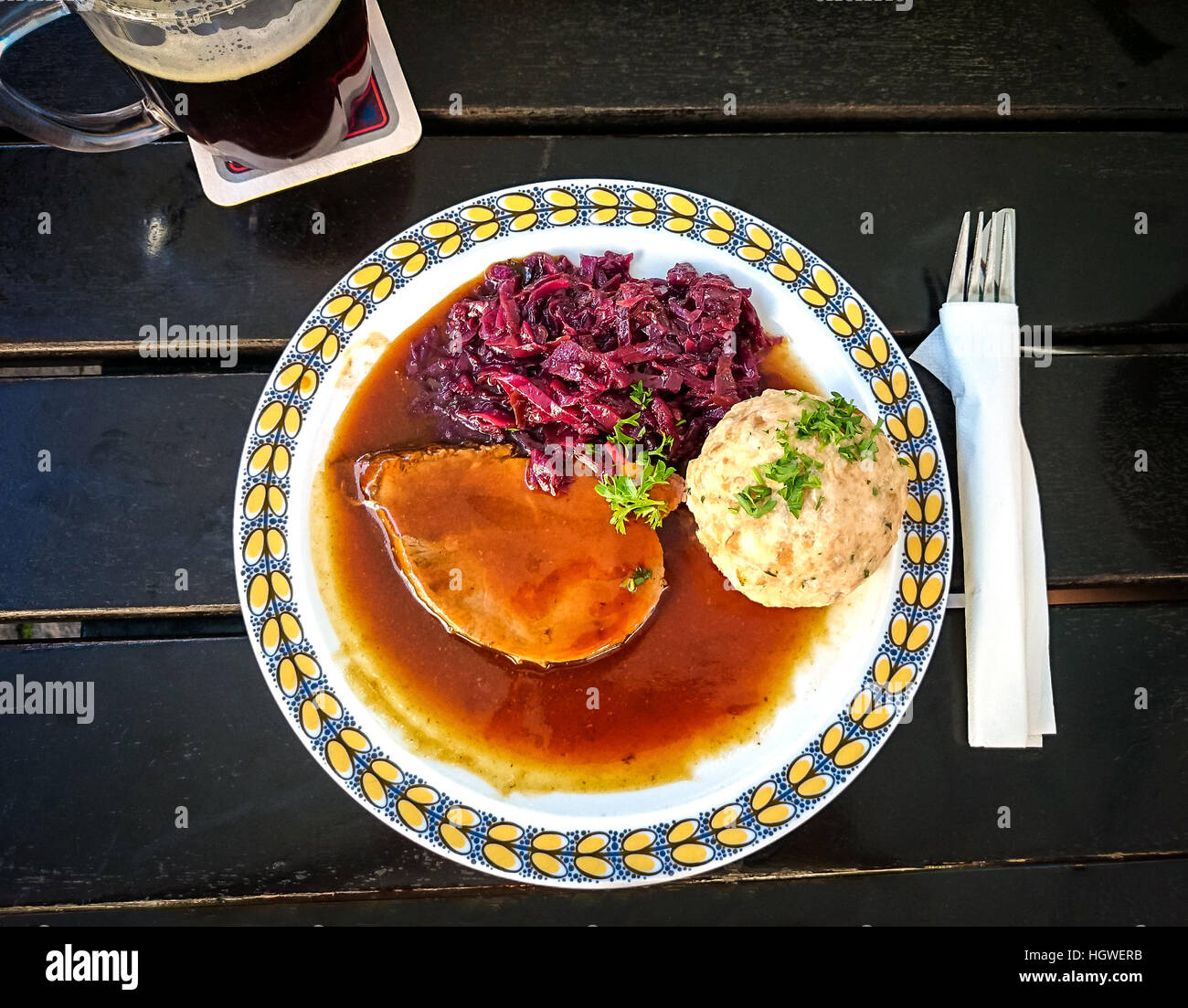 Bavarian Sauerbraten of beef with red cabbage and bread dumplings Stock Photo