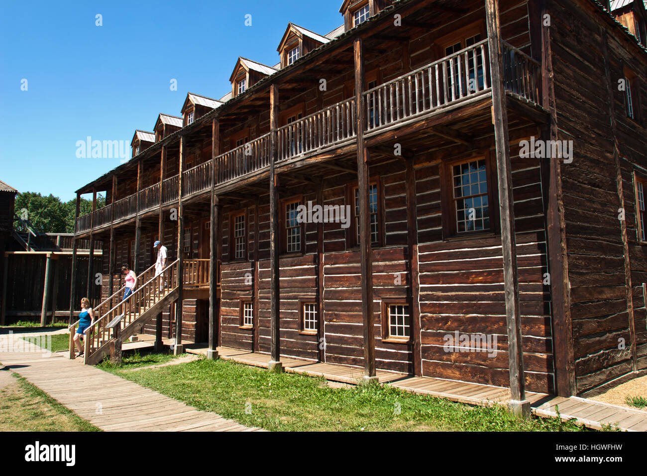 Fort Edmonton, Alberta, Canada, British fort that became Edmonton, log walls of a headquarters building with covered walkway Stock Photo