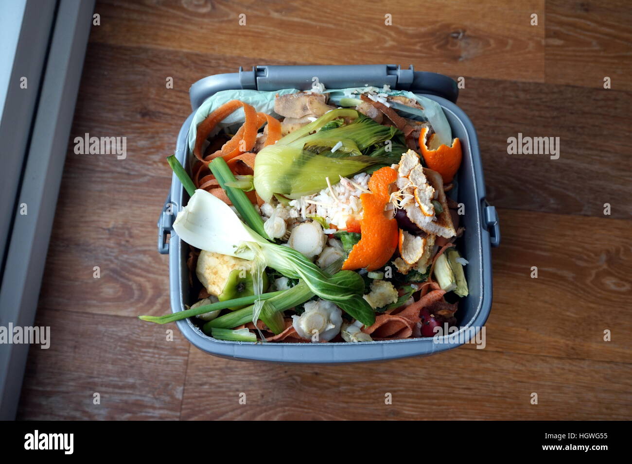 Full domestic food waste caddy, ready to be recycled Stock Photo Alamy