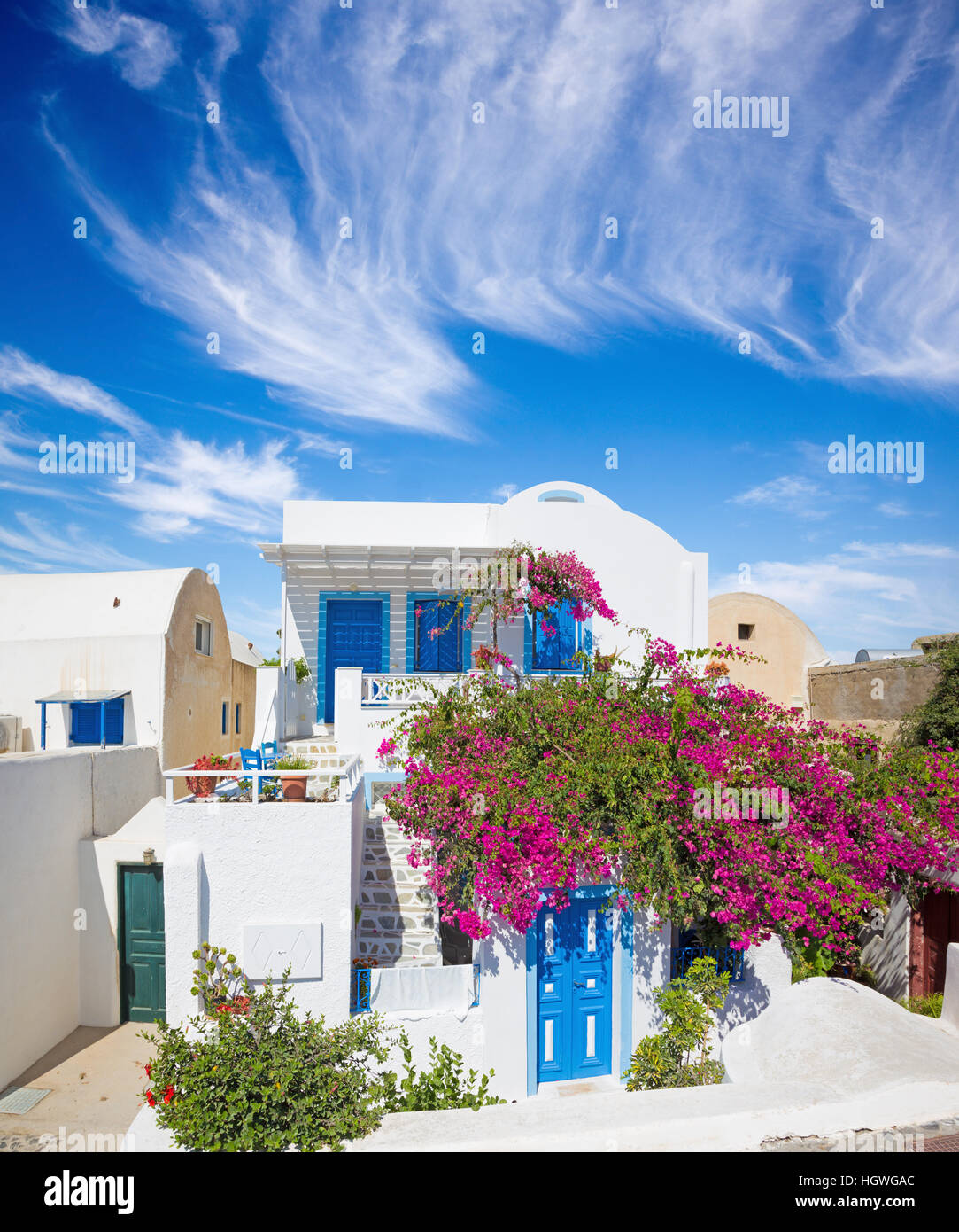 Santorini - The typically little house and yard with he flowers in Oia. Stock Photo