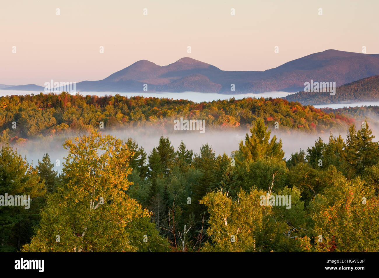 Morning fog and the Percy Peaks as seen from the fire tower at Milan