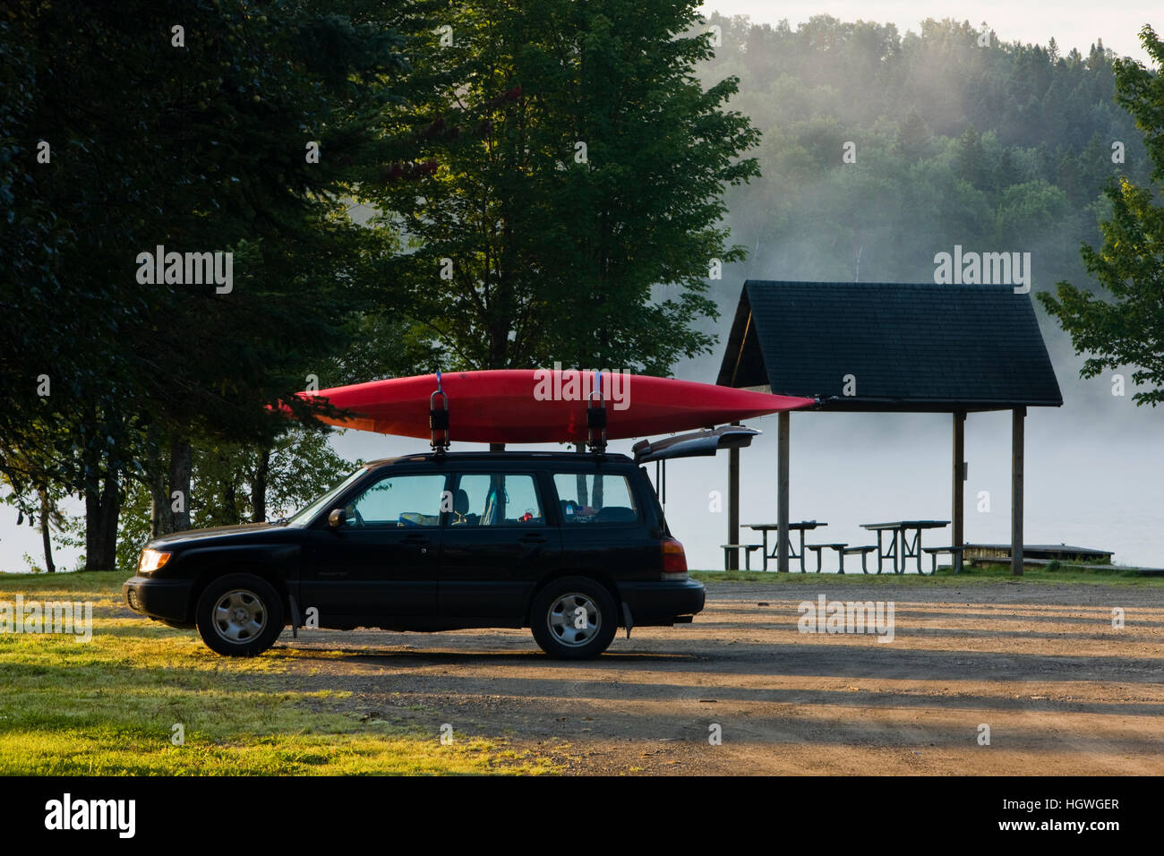 A car with a akayak at the boat lauch area at Lake Francis State Park