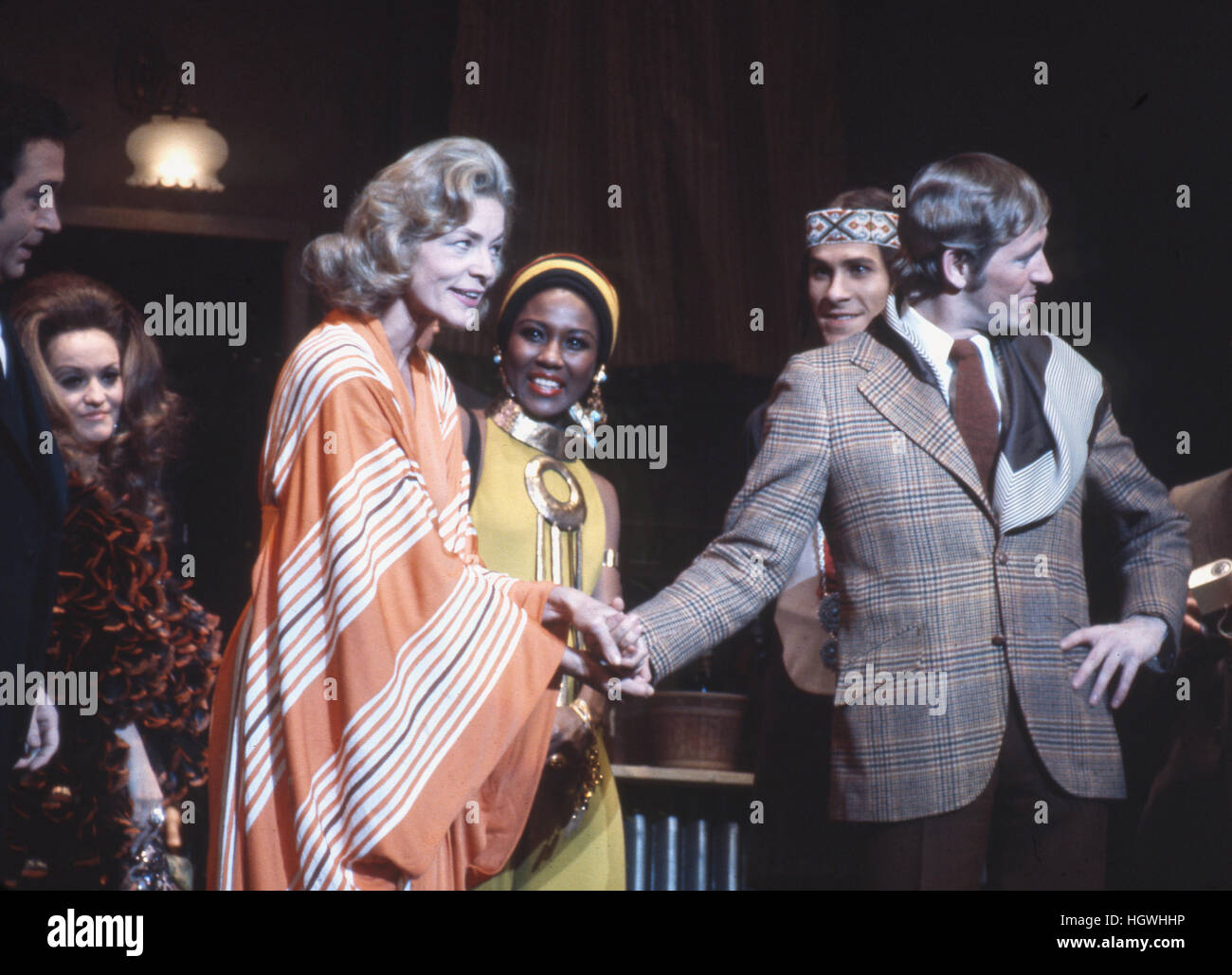 Len Cariou (right side, wearing jacket) and Lauren Bacall, on stage in the 1970 Broadway musical Applause. Stock Photo