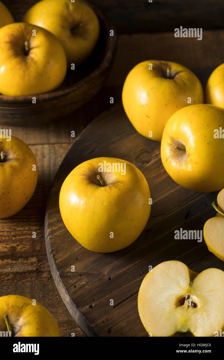 https://c8.alamy.com/comp/HGWJC0/raw-yellow-organic-opal-apples-ready-to-eat-HGWJC0.jpg