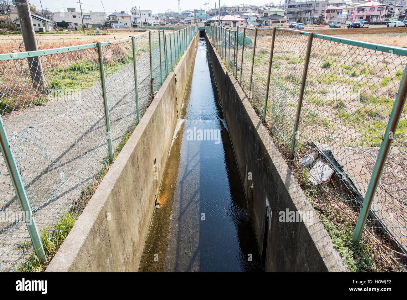 Concrete protected canal, Isehara City, Kanagawa Prefecture, Japan Stock Photo