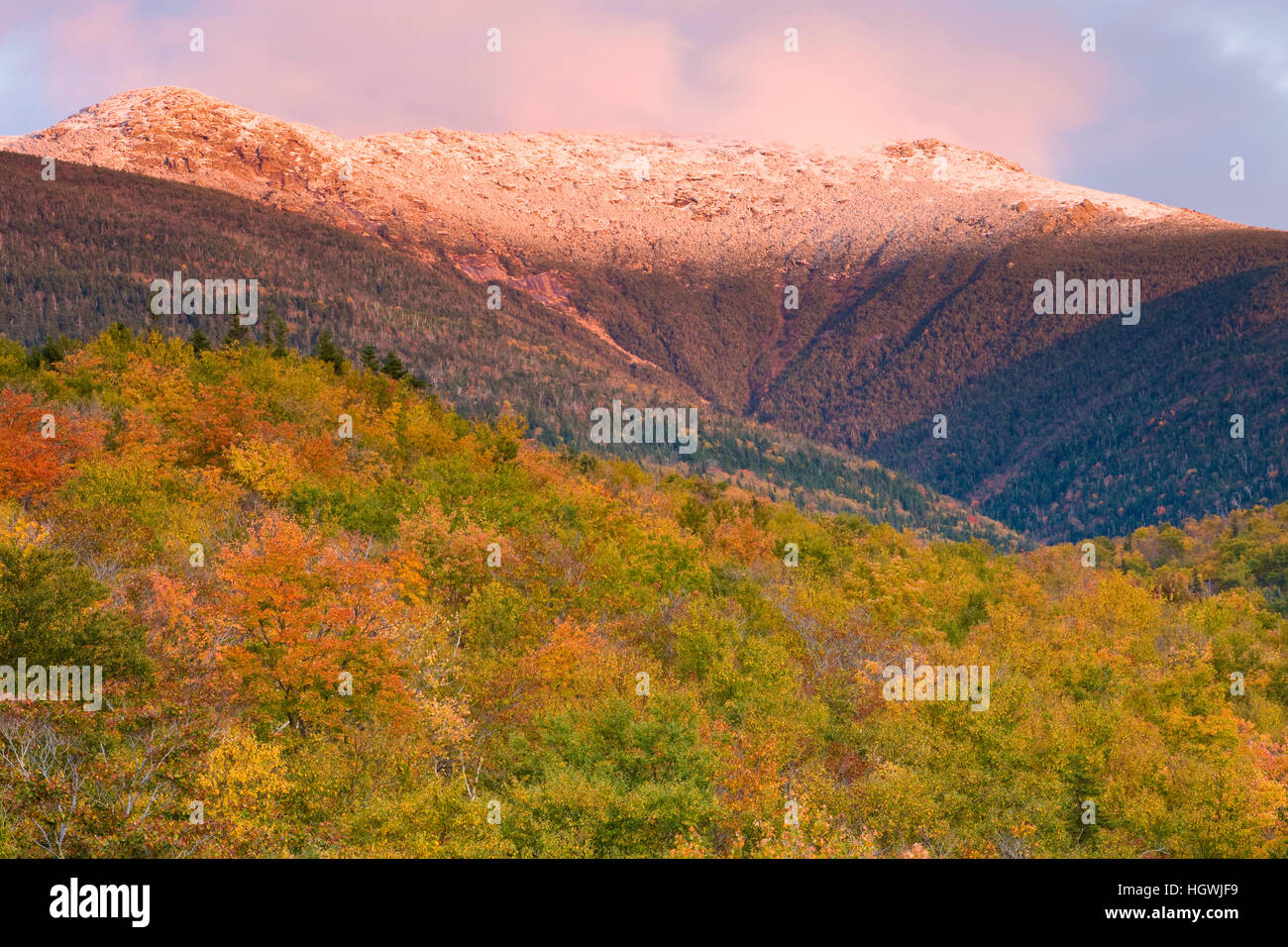A snowcapped Mount Lafayette in fall in New Hampshire's White