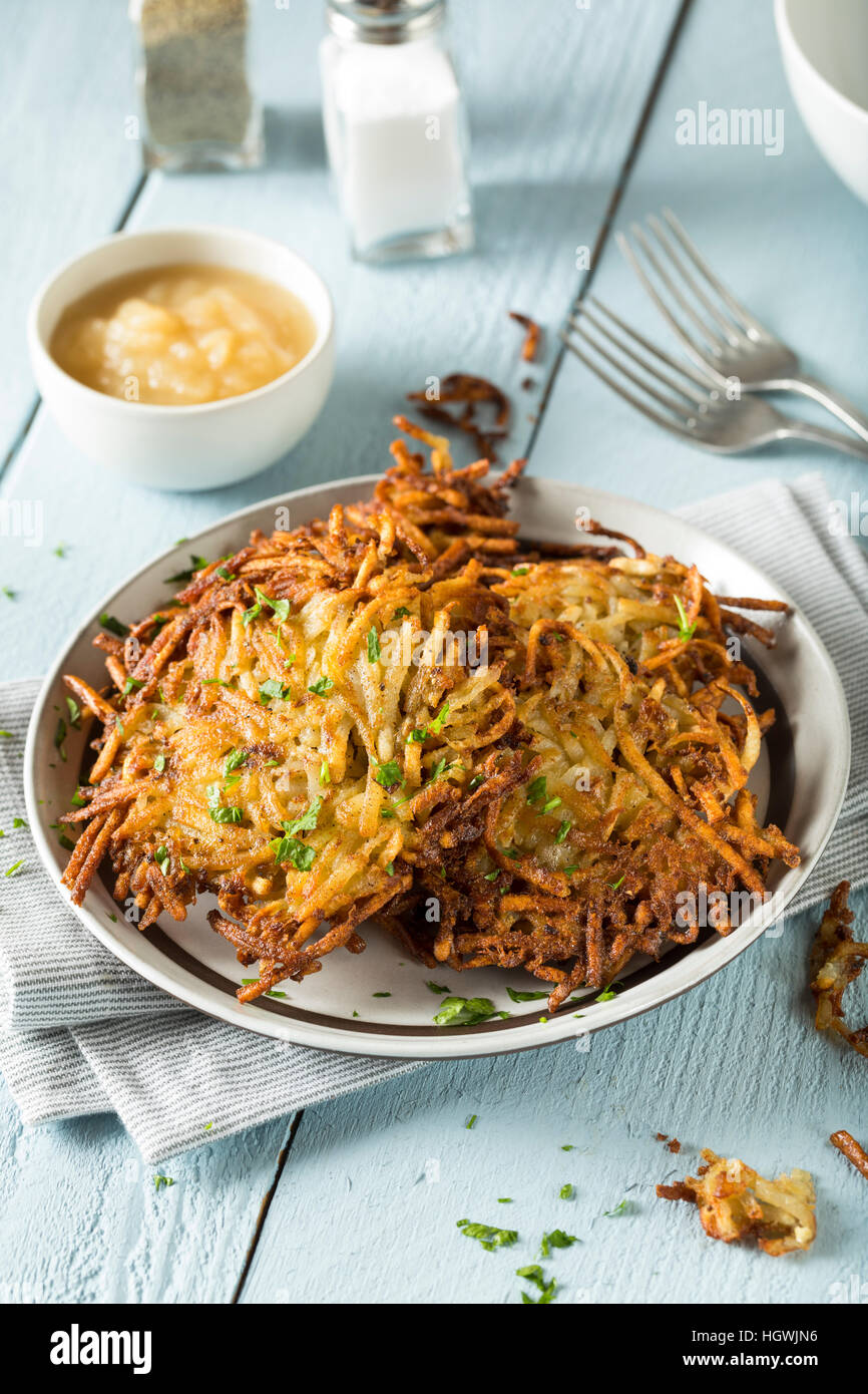 Homemade Traditional Potato Latkes with Apple Sauce Stock Photo