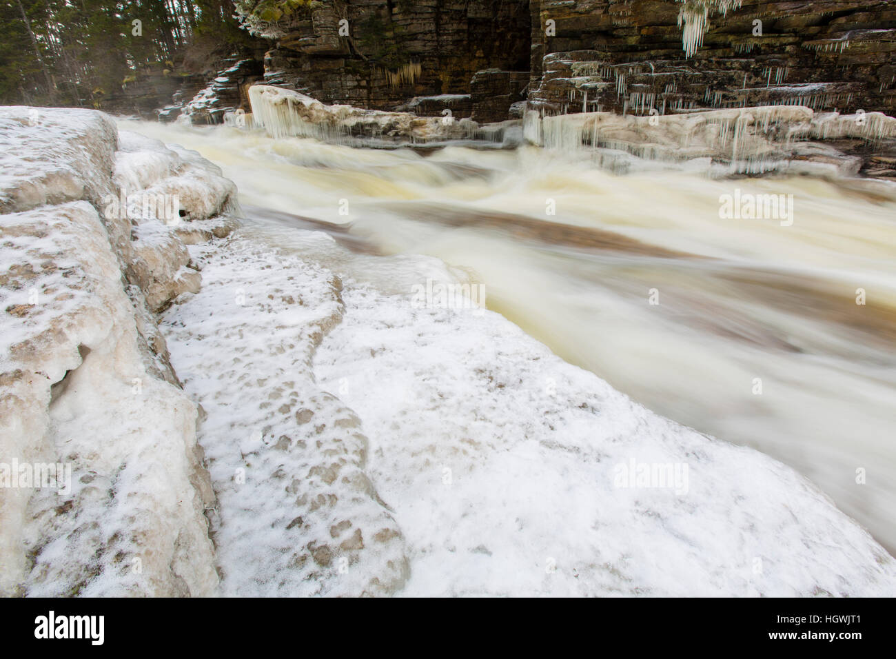 Icicles and Lower Falls on the Ammonoosuc River in Twin Mountain, New Hampshire. Stock Photo