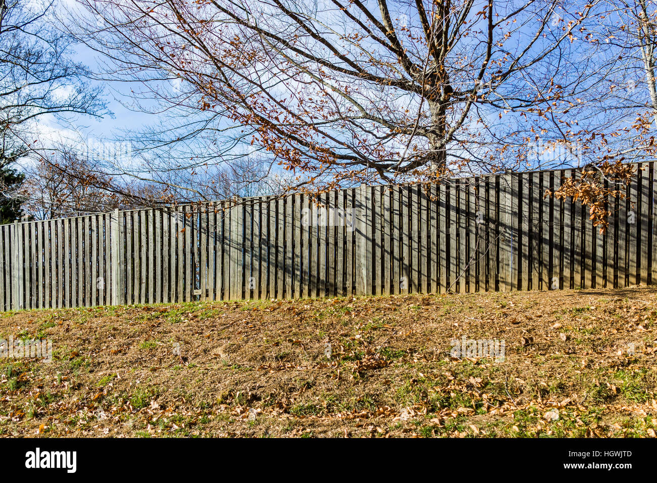 Wooden Fence On Hill In Rural Area During Autumn With Trees Stock Photo Alamy