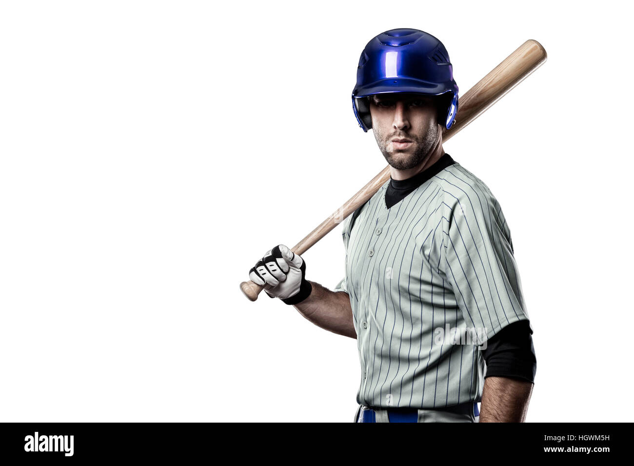 Baseball Player in a blue uniform, on a white background Stock Photo
