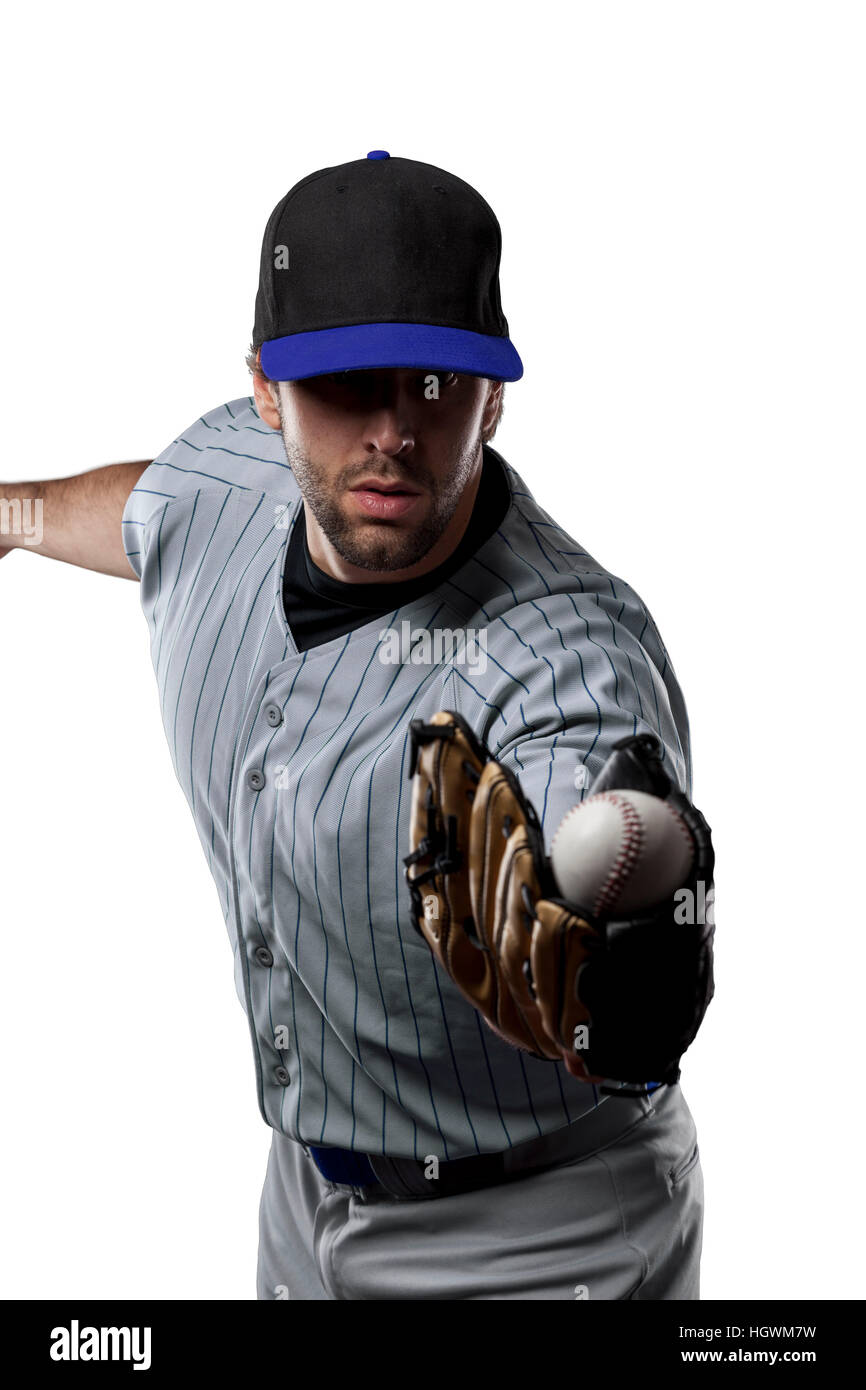 Baseball Player in a blue uniform, on a white background Stock Photo