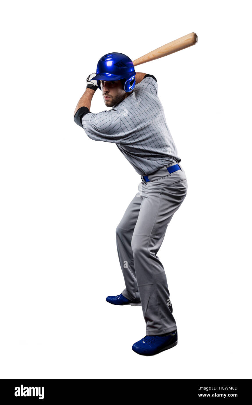 Baseball Player in a blue uniform, on a white background Stock Photo