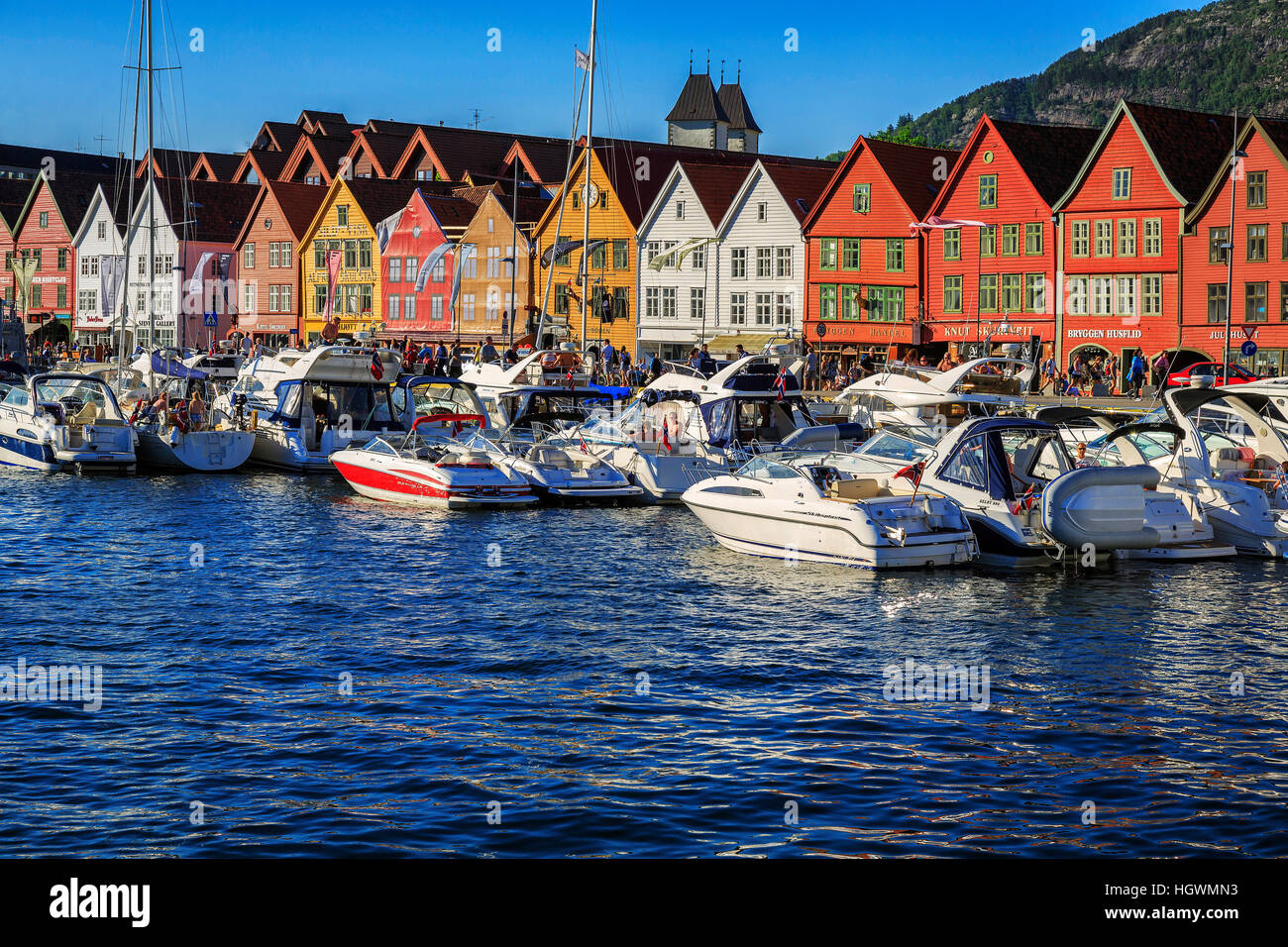 Warehouses in Bergen, Norway with pleasure boats in the foreground Stock Photo