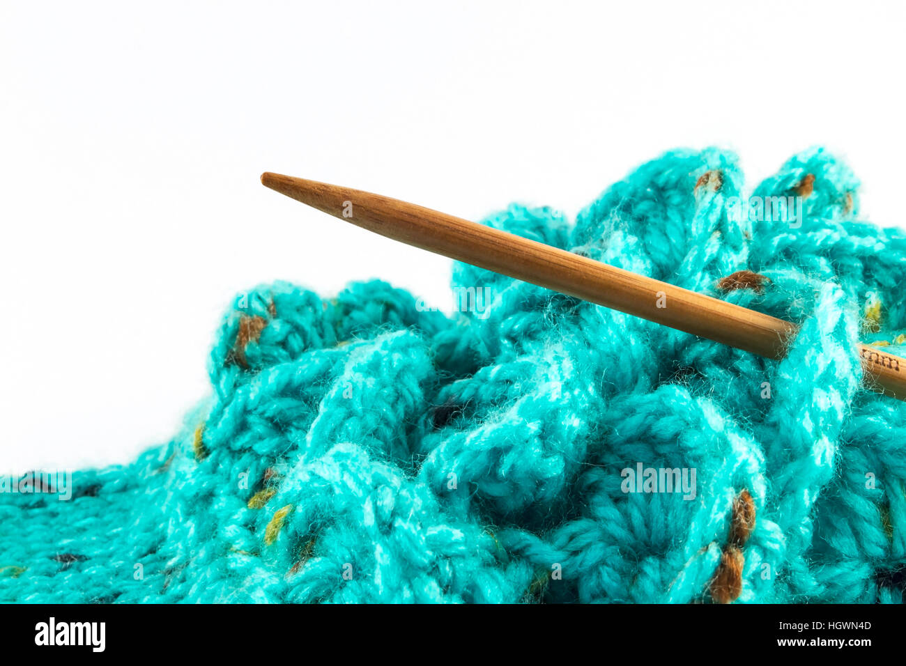 Crochet hook and wool on white background Stock Photo Alamy