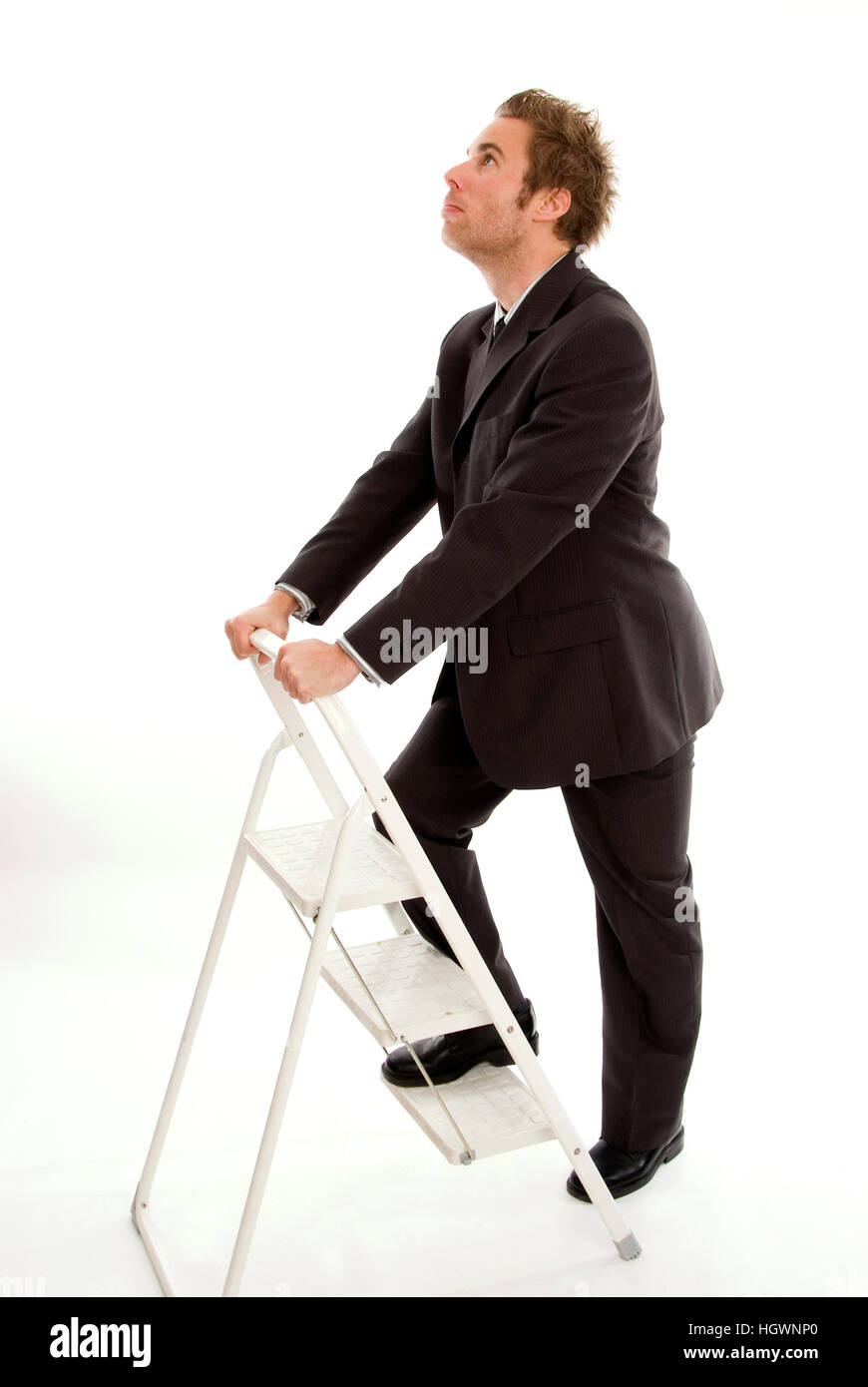 Young business man on job ladder Stock Photo Alamy