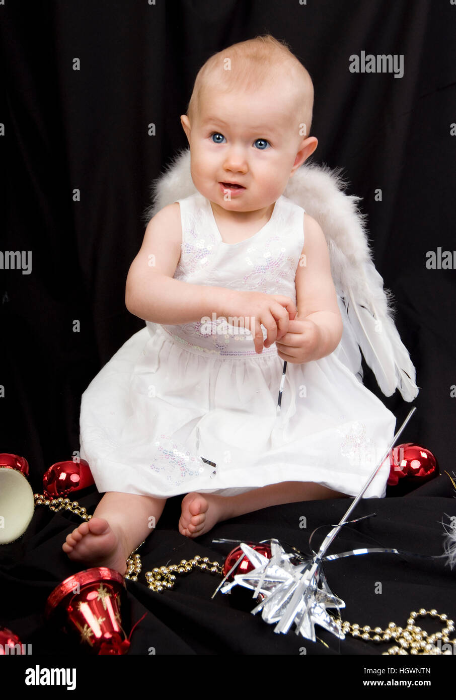 Child as a christmas angel Stock Photo Alamy