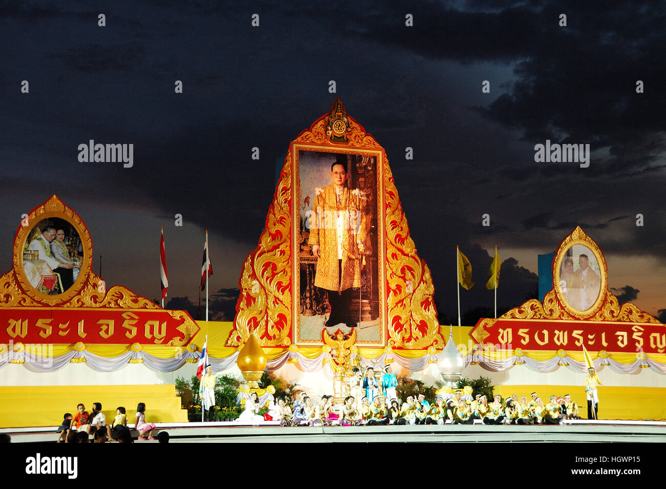 Monumental photographs of the king of Thailand over the stage, celebrations of the kings birthday, Bangkok, Thailand Stock Photo