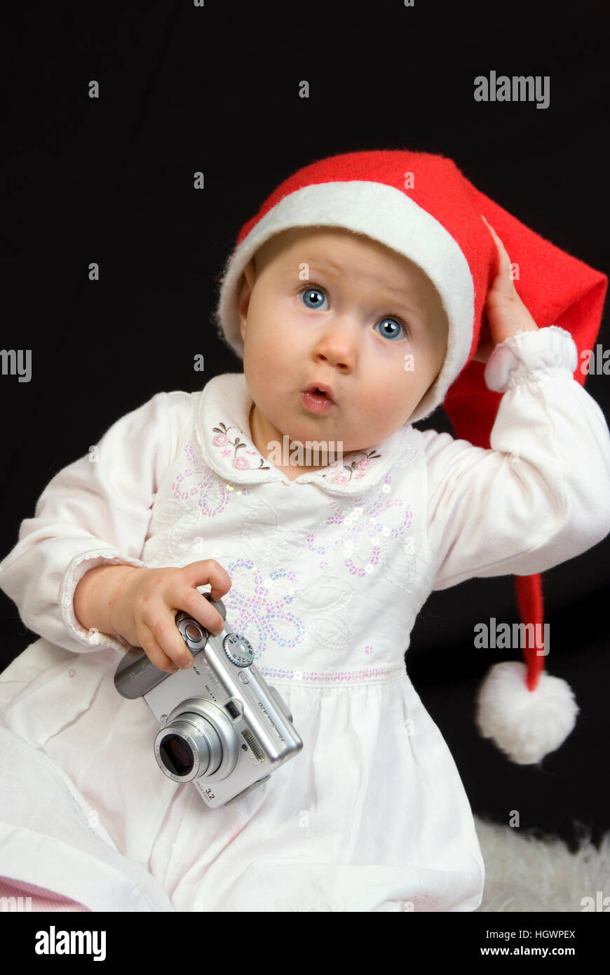 Child with digi cam at christmas Stock Photo