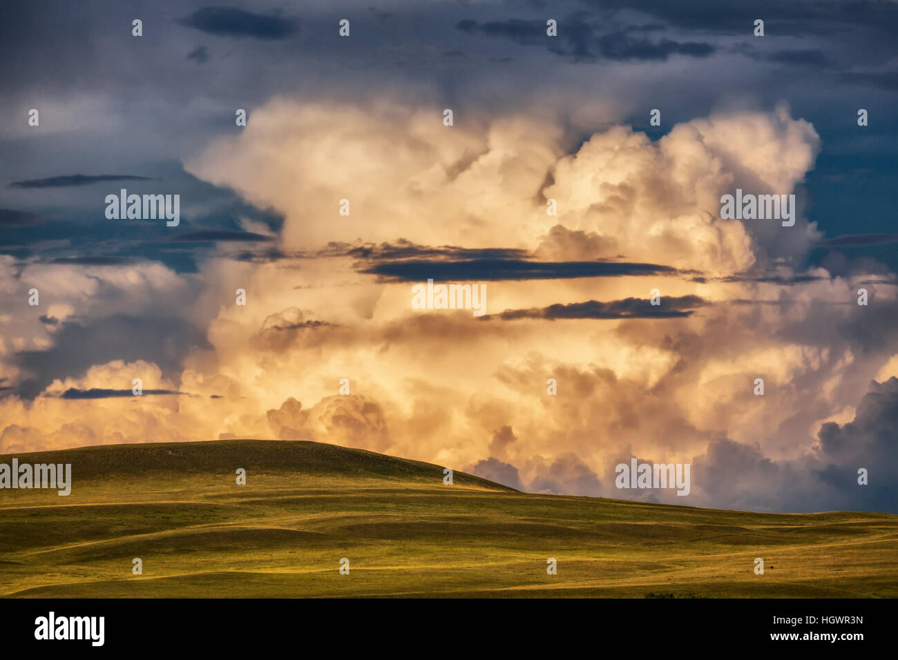 Storm Clouds above green fields Stock Photo - Alamy