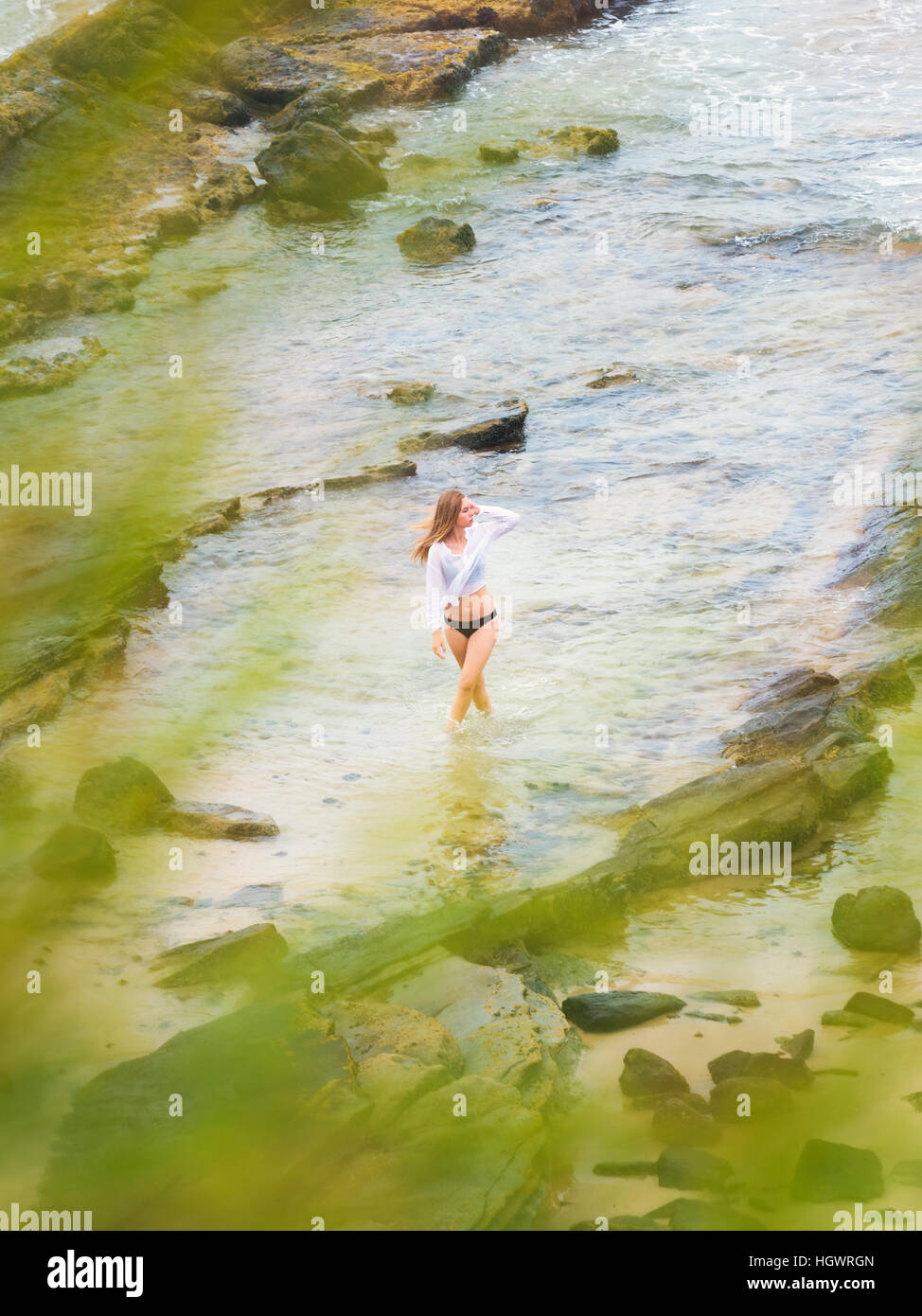 Woman alone walking beach hi-res stock photography and images - Alamy