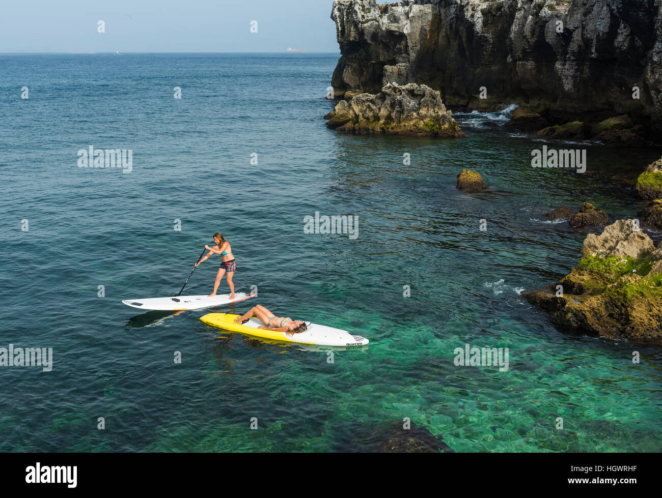Women enjoying stand up paddle surf. Tarifa, Costa de la Luz, Cadiz