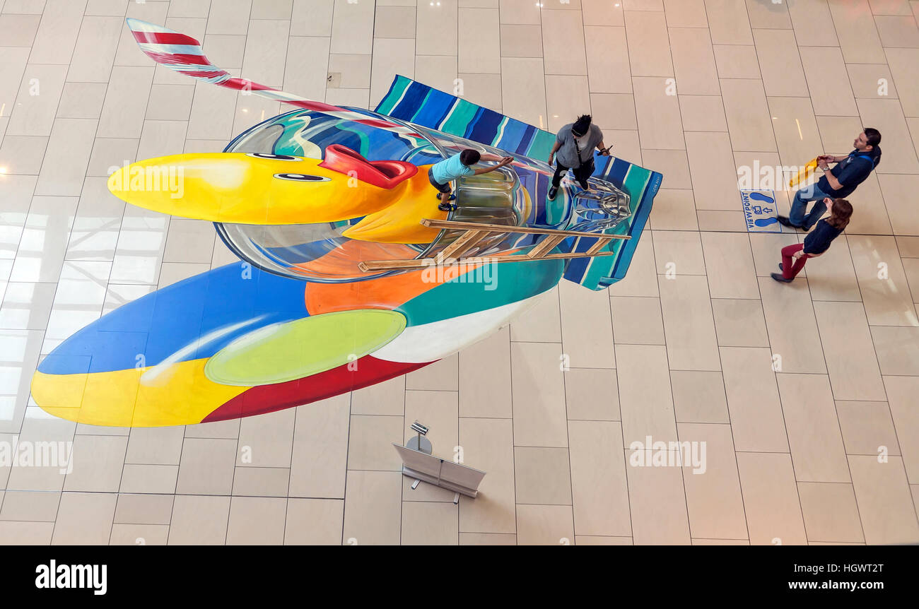 Sofia, Bulgaria - May 24, 2016: Two girls play on painted the floor in the shopping mall Sofia Ring Stock Photo