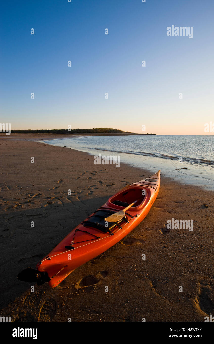 A kayak on the beach at dawn at the Shifting Lots Preserve in Plymouth