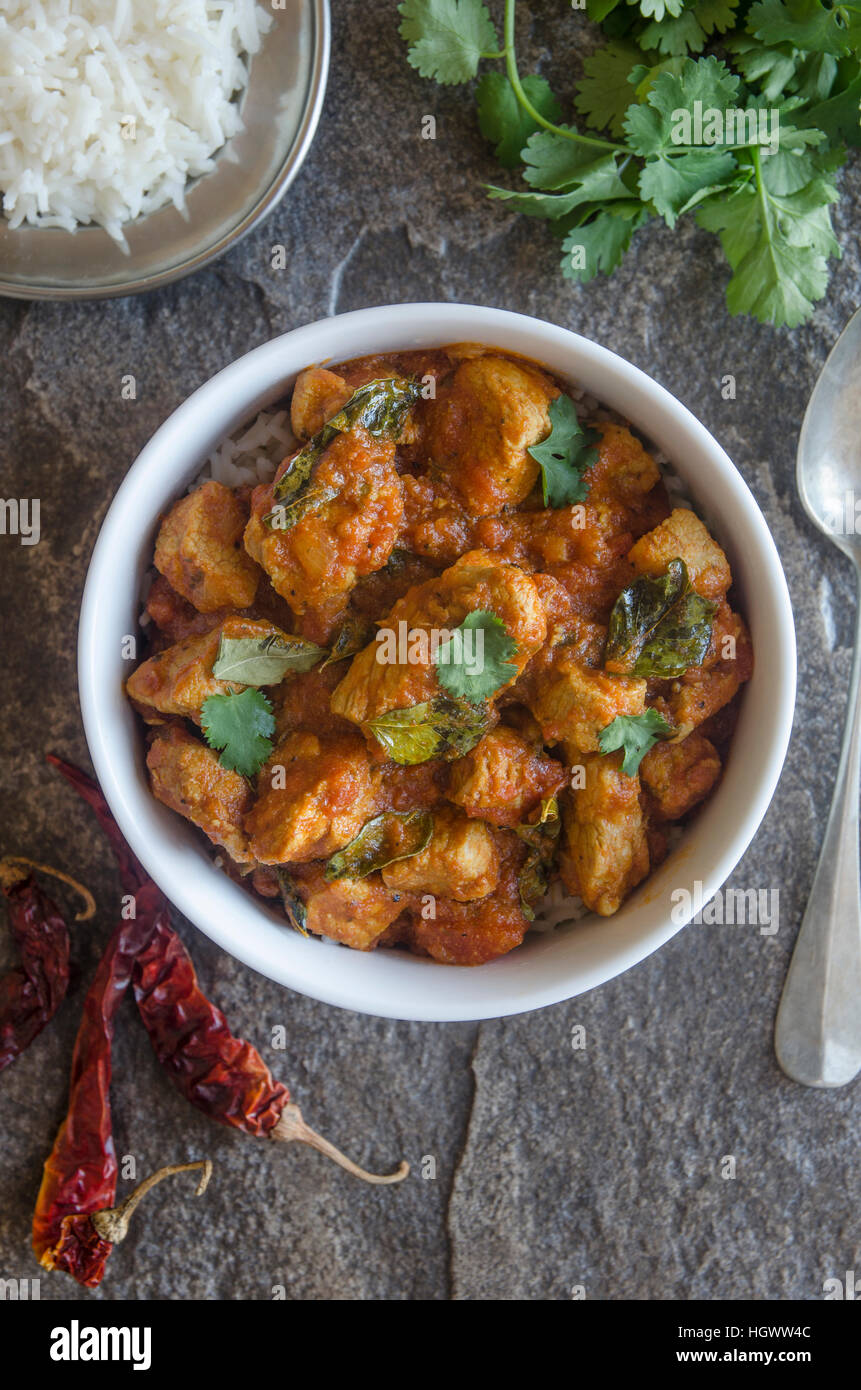 Indian pork curry with basmati rice Stock Photo Alamy