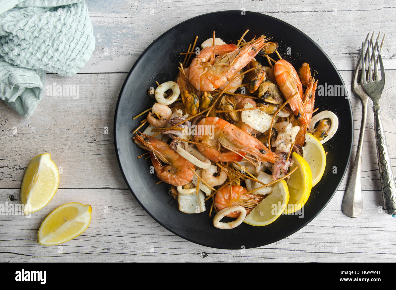 Deepfried seafood mix with spaghetti Stock Photo Alamy