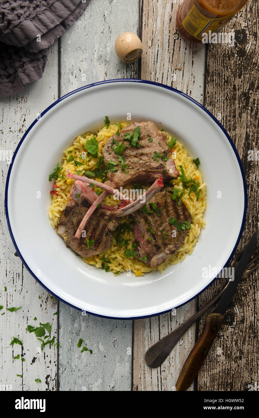 Griddled lamb chops with rice Stock Photo Alamy