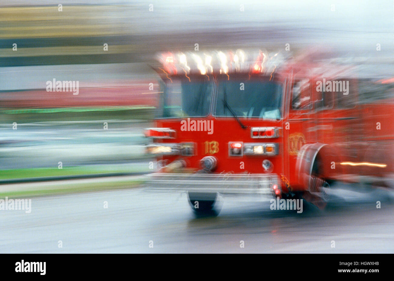 Fire truck on road to call Stock Photo