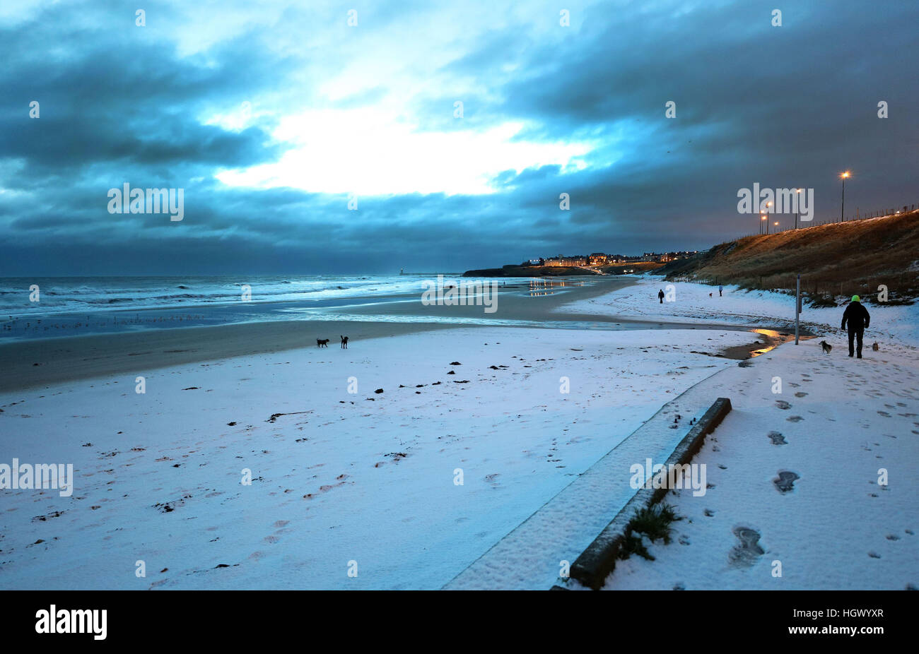 Overnight snow on Tynemouth Beach, North Tyneside, after some overnight snow, as Scotland and the North of England were covered in a blanket of snow while the east coast was braced for a storm surge at Friday lunchtime. Stock Photo