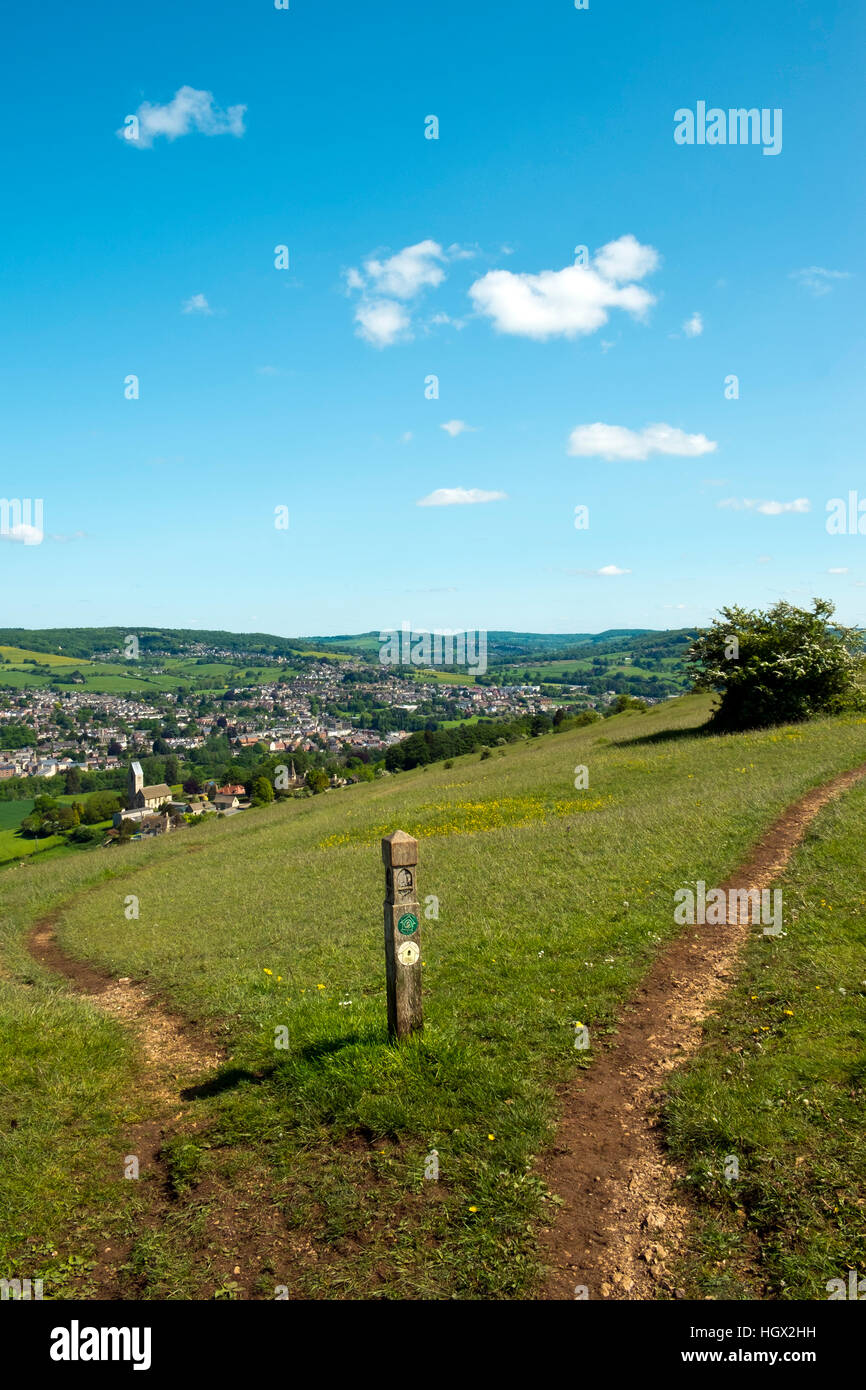 View from The Cotswold Way long distance footpath over Selsley village and church towards Stroud on the edge of the Cotswold Hills, Gloucestershire, UK Stock Photo