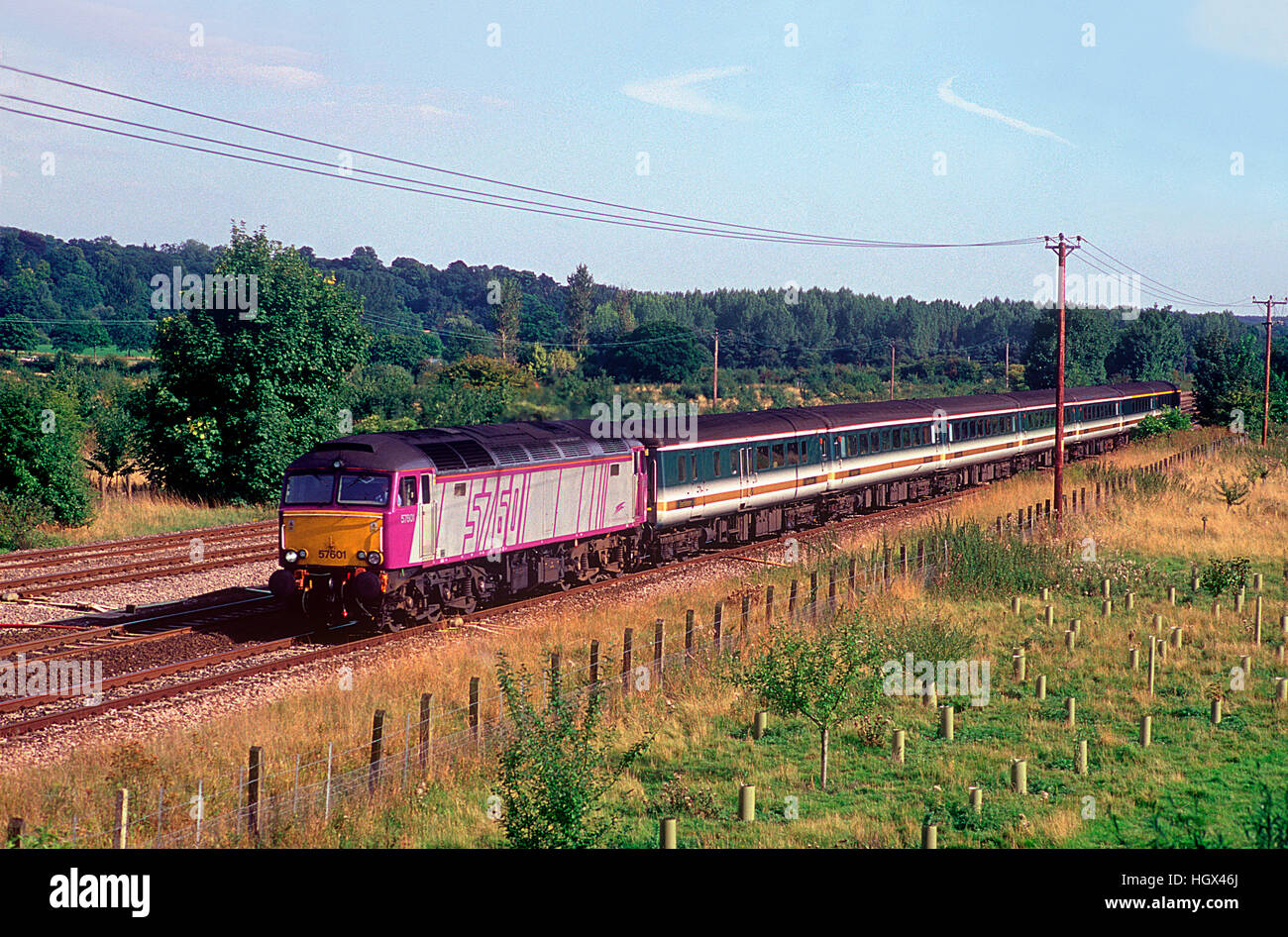 A class 57 diesel locomotive number 57601 in Porterbrook livery working a First Great Western service at Lower Basildon on the 28th August 2001. Stock Photo